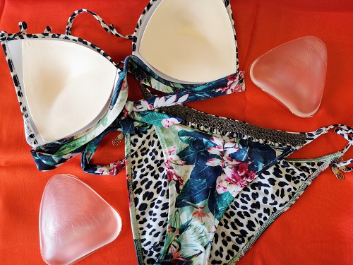 A Watercult triangle bikini with foam inserts inside the cups and silicone inserts laid at the side