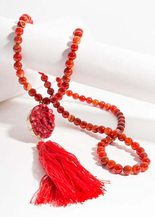 Red neckline with large tassel